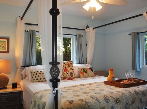 Four poster bed in one bedroom villa.