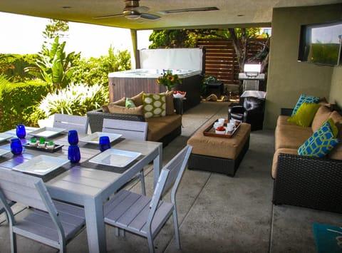 Outdoor Living! 1000 sq feet of covered, private patio space with 50" smart TV.