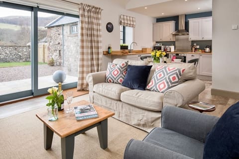 The Barn at Reedsford - sitting room and door to patio