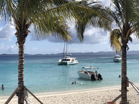 On the beach, sun loungers, beach towels