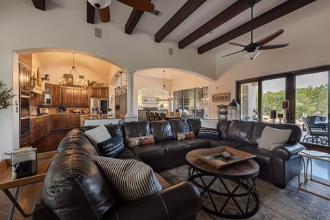 Main living area of 1,000 square feet with large sliding door out to pool area