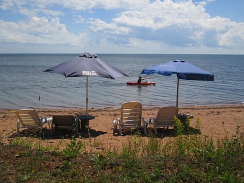 On the beach, sun loungers