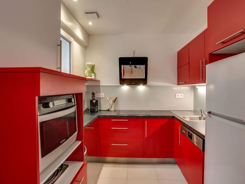 Countertop, Cabinetry, Room, Red, Kitchen, Property, Interior Design, Furniture, Building, Major Appliance