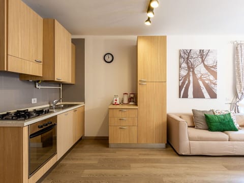 Cabinetry, Property, Sink, Countertop, Wood, Lighting, Drawer, Interior Design, Architecture, Floor