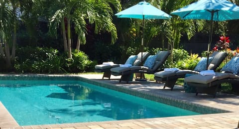 Lounge pool side in comfort and watch the butterflies and birds!