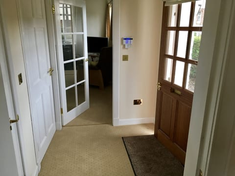 Entrance hall with guest toilet to left