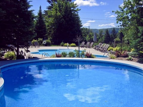 Outdoor pool, a heated pool, sun loungers