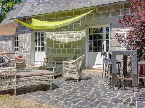 Furniture, Property, Window, Outdoor Table, Building, Outdoor Furniture, Brick, Shade, Tree, Plant