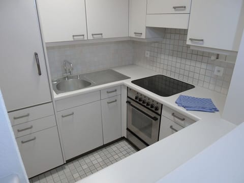 Property, Countertop, Room, Kitchen, Cabinetry, Sink, Furniture, Tile, Interior Design, Floor