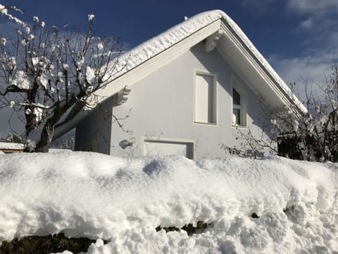 Sky, Daytime, Building, Cloud, Plant, Snow, Window, House, Branch, Slope