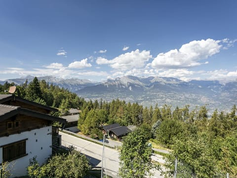 Cloud, Sky, Mountain, Ecoregion, Building, Highland, Tree, Window, House, Natural Landscape