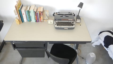 Desk with typewriter & books for your use during your stay.
