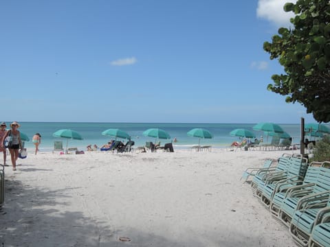 On the beach, sun loungers, beach towels