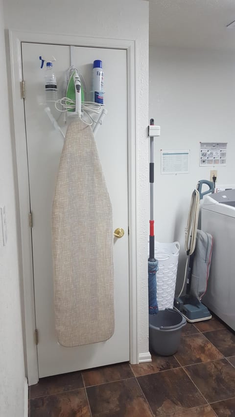 Iron, Ironing Board, Starch, Spray bottle in Laundry room