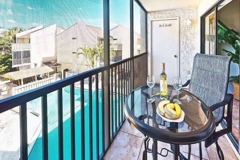 You'll love the views from the private screened lanai.  Beach items stored behind the door!