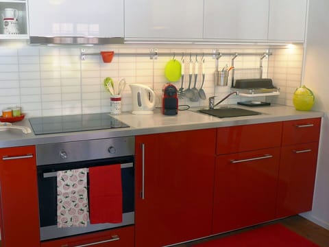 Countertop, Kitchen, Cabinetry, Room, Furniture, Property, Major Appliance, Kitchen Stove, Interior Design, Home Appliance