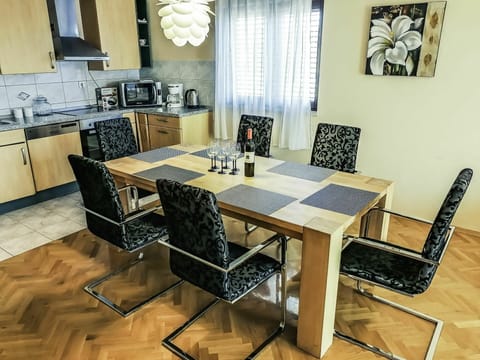 Table, Furniture, Property, Chair, Wood, Interior Design, Flooring, Lighting, Cabinetry, Floor