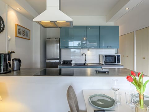 Kitchen, Countertop, Kitchen Appliance, Furniture, Interior Design, Cabinetry, Flooring, Major Appliance, Ceiling, Wood