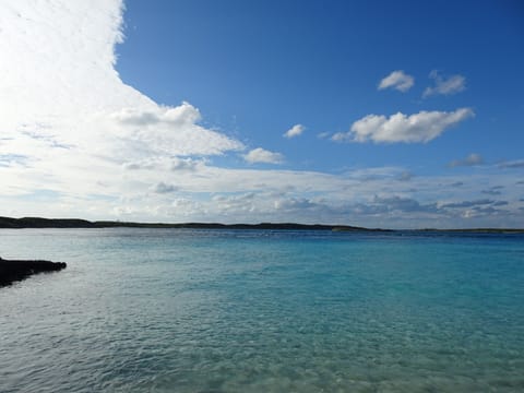 On the beach, sun loungers, beach towels