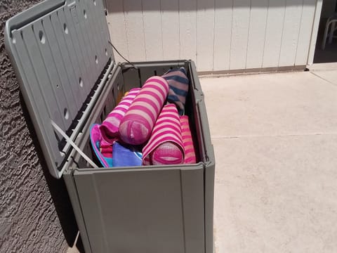 A box of pool toys is available for your use.