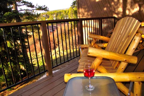 Enjoy the views and cool mountain air from the large covered balcony
