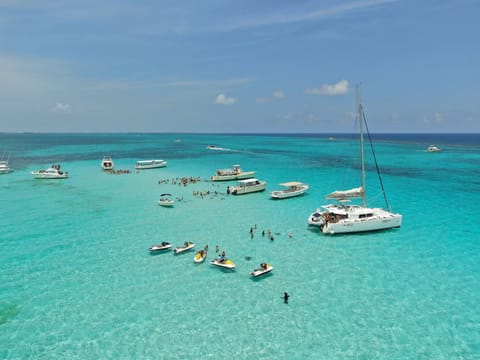 On the beach, sun loungers, beach towels