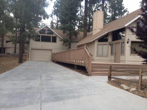 long flat driveway. Can fit 6 cars. Plenty of room for a boat or other toys.