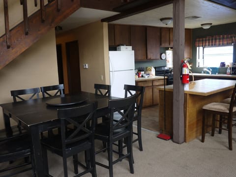 Dining table with counter stools