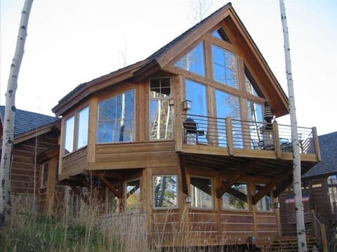 Rear view showing deck and windows.