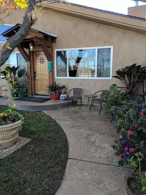 Inviting entrance to the home. Sit relax and enjoy the city lights and OD air.