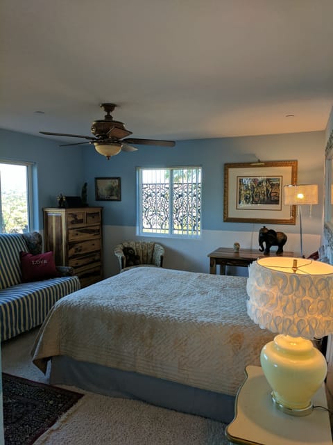 Large beautiful master bedroom, staged for a relaxing one of a kind stay w/views