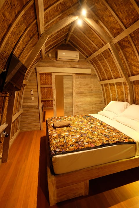 wooden arch building structure with woven bamboo wall