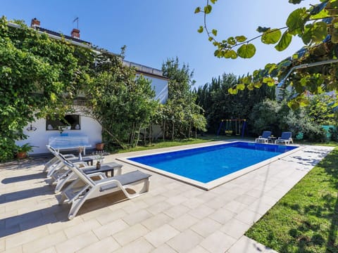 Plant, Property, Sky, Swimming Pool, Azure, Shade, Building, Outdoor Furniture, Tree, Leisure
