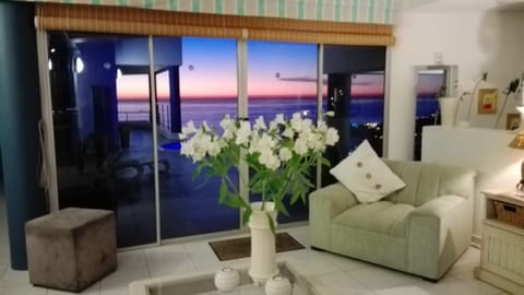 Living room and Jacuzzi patio at sunset!