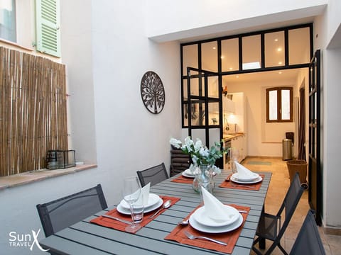 View of terrace dining area looking back into kitchen