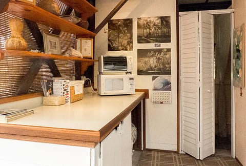Second kitchen counter and door into changing area, closet and half bath