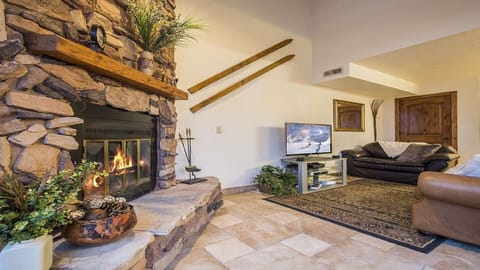 Living area | TV, fireplace, foosball, books
