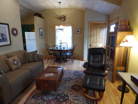 Living And Dining Area With Several Antiques