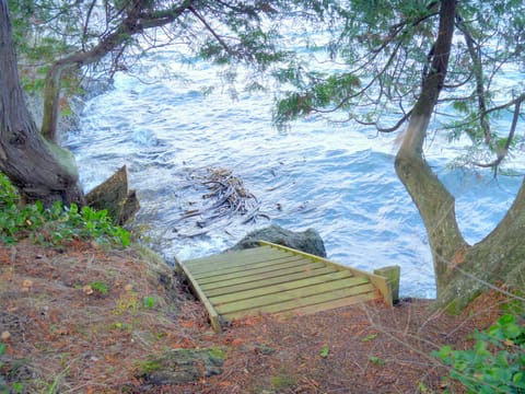 The tide is in, stairs to the north edge of property, great for launching kayaks