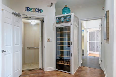 1st Floor Elevator entrance and large wine fridge!