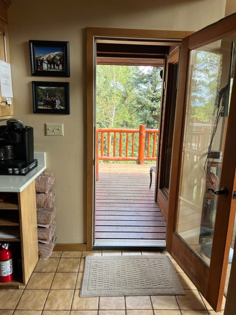 Wooded backyard provides tons of privacy, overlooks golf course & babbling brook