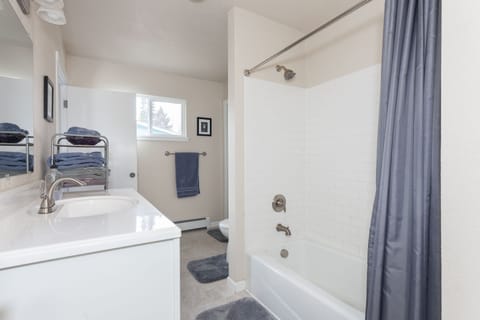 Combined shower/tub, hair dryer, towels, soap