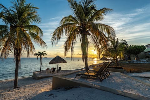 On the beach, sun loungers, beach towels