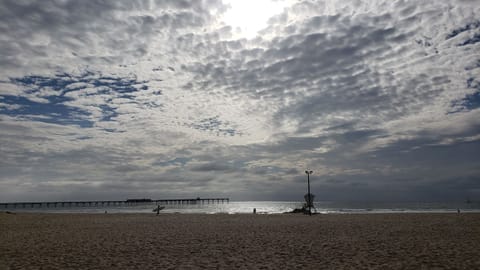 On the beach, sun loungers, beach towels