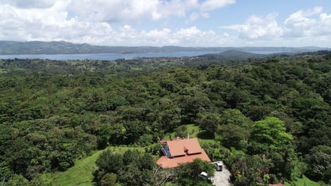 Aerial View of House and Lake Arenal.