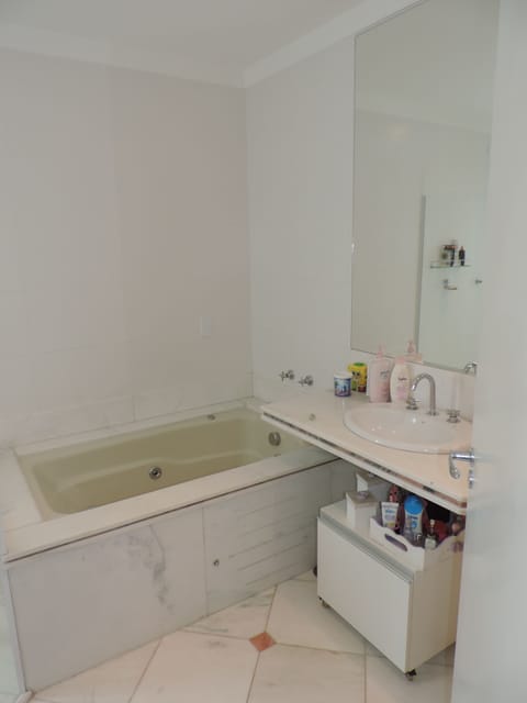 Shower, jetted tub, towels, soap