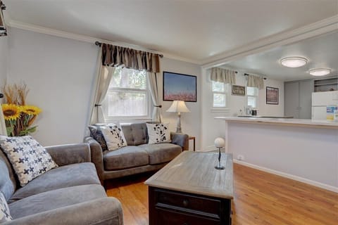 Comfortable sofa eating with coffee table that moves up & down for working.