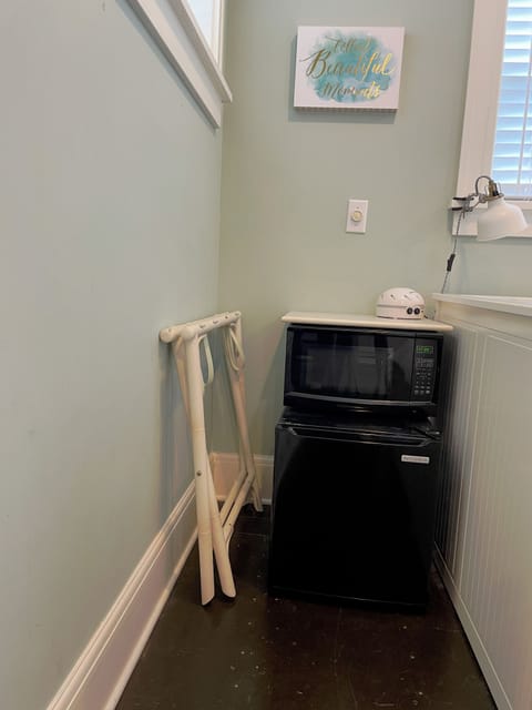 Mini-fridge and microwave, sound machine and luggage rack