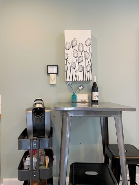 2 person bistro table for eating/workspace. Keurig coffee, electric water kettle