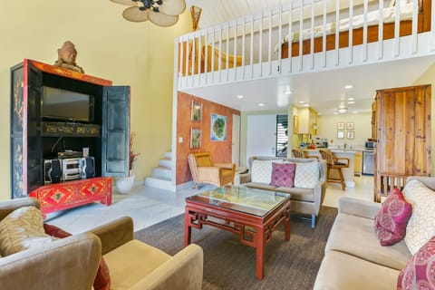 Living Room with Antique Chinese Hutch with Flat Screen TV